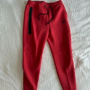 Brand new Nike Slim Fit Tech Fleece Joggers. Men’s size large. (Red)